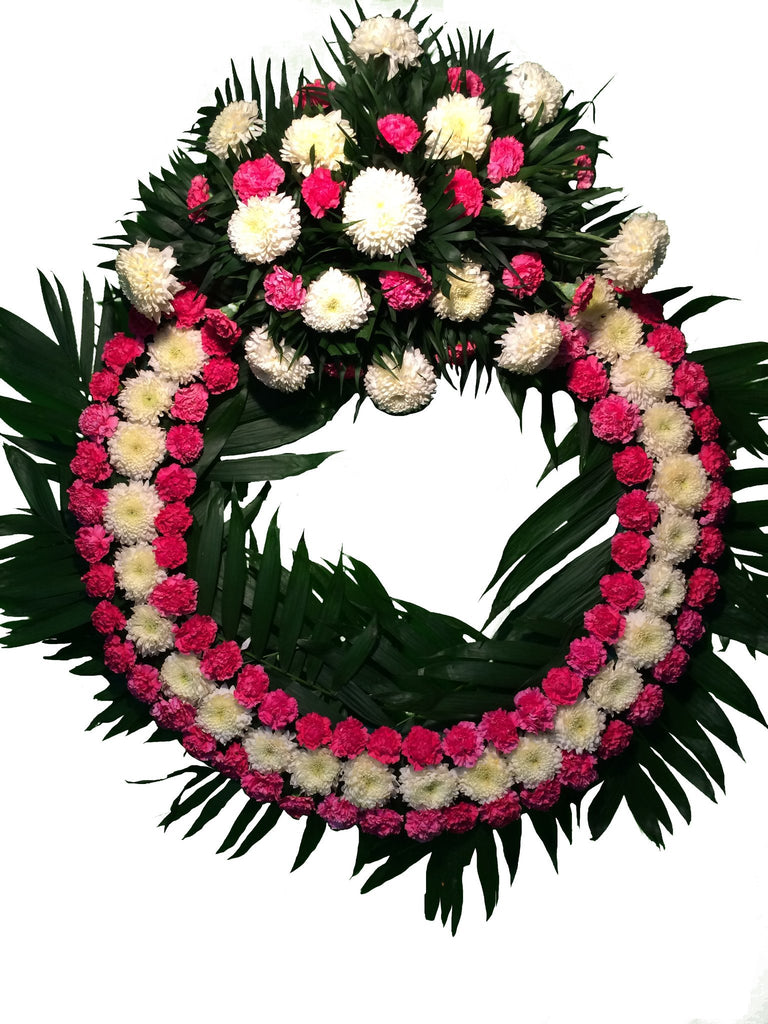 Corona (100 cm) Polar con Clavel rosa con Copete